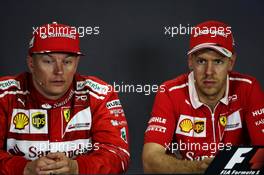 (L to R): Kimi Raikkonen (FIN) Ferrari in the FIA Press Conference with race winner and team mate Sebastian Vettel (GER) Ferrari. 30.07.2017. Formula 1 World Championship, Rd 11, Hungarian Grand Prix, Budapest, Hungary, Race Day.