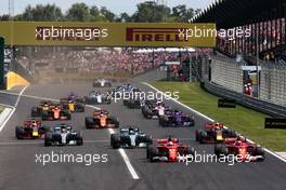 (L to R): Sebastian Vettel (GER) Ferrari SF70H and Kimi Raikkonen (FIN) Ferrari SF70H lead at the start of the race. 30.07.2017. Formula 1 World Championship, Rd 11, Hungarian Grand Prix, Budapest, Hungary, Race Day.