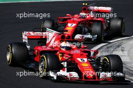 Sebastian Vettel (GER) Ferrari SF70H leads team mate Kimi Raikkonen (FIN) Ferrari SF70H. 30.07.2017. Formula 1 World Championship, Rd 11, Hungarian Grand Prix, Budapest, Hungary, Race Day.