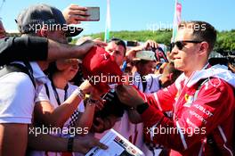 Sebastian Vettel (GER) Ferrari signs autographs for the fans. 29.07.2017. Formula 1 World Championship, Rd 11, Hungarian Grand Prix, Budapest, Hungary, Qualifying Day.