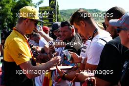 Nico Hulkenberg (GER) Renault Sport F1 Team signs autographs for the fans. 29.07.2017. Formula 1 World Championship, Rd 11, Hungarian Grand Prix, Budapest, Hungary, Qualifying Day.