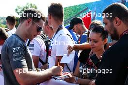 Stoffel Vandoorne (BEL) McLaren signs autographs for the fans. 29.07.2017. Formula 1 World Championship, Rd 11, Hungarian Grand Prix, Budapest, Hungary, Qualifying Day.