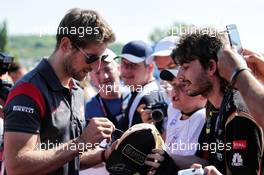 Romain Grosjean (FRA) Haas F1 Team signs autographs for the fans. 29.07.2017. Formula 1 World Championship, Rd 11, Hungarian Grand Prix, Budapest, Hungary, Qualifying Day.