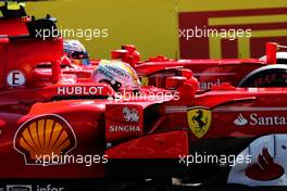 Pole sitter Sebastian Vettel (GER) Ferrari SF70H in parc ferme with team mate Kimi Raikkonen (FIN) Ferrari SF70H. 29.07.2017. Formula 1 World Championship, Rd 11, Hungarian Grand Prix, Budapest, Hungary, Qualifying Day.