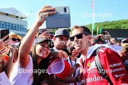Sebastian Vettel (GER) Ferrari with fans. 29.07.2017. Formula 1 World Championship, Rd 11, Hungarian Grand Prix, Budapest, Hungary, Qualifying Day.