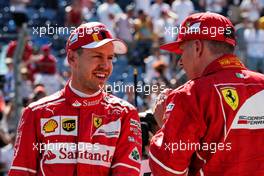 (L to R): Sebastian Vettel (GER) Ferrari in qualifying parc ferme with team mate Kimi Raikkonen (FIN) Ferrari. 29.07.2017. Formula 1 World Championship, Rd 11, Hungarian Grand Prix, Budapest, Hungary, Qualifying Day.