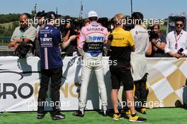(L to R): Will Hings (GBR) Sahara Force India F1 Press Officer; Esteban Ocon (FRA) Sahara Force India F1 Team; Andy Stobart (GBR) Renault Sport F1 Team Press Officer; and Jolyon Palmer (GBR) Renault Sport F1 Team, with the media. 29.07.2017. Formula 1 World Championship, Rd 11, Hungarian Grand Prix, Budapest, Hungary, Qualifying Day.