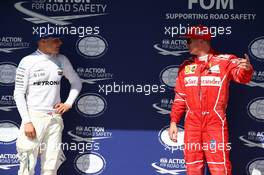 Valtteri Bottas (FIN) Mercedes AMG F1 W08 and Kimi Raikkonen (FIN) Ferrari SF70H. 29.07.2017. Formula 1 World Championship, Rd 11, Hungarian Grand Prix, Budapest, Hungary, Qualifying Day.