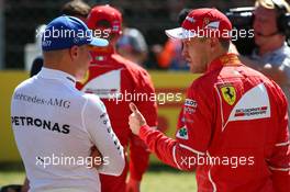 Valtteri Bottas (FIN) Mercedes AMG F1 W08 and Sebastian Vettel (GER) Ferrari SF70H. 29.07.2017. Formula 1 World Championship, Rd 11, Hungarian Grand Prix, Budapest, Hungary, Qualifying Day.