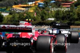 Lance Stroll (CDN) Williams FW40 leads Kimi Raikkonen (FIN) Ferrari SF70H. 29.07.2017. Formula 1 World Championship, Rd 11, Hungarian Grand Prix, Budapest, Hungary, Qualifying Day.