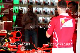 Sebastian Vettel (GER) Ferrari with a young fan in the Ferrari SF70H. 27.07.2017. Formula 1 World Championship, Rd 11, Hungarian Grand Prix, Budapest, Hungary, Preparation Day.