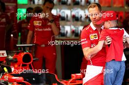 Sebastian Vettel (GER) Ferrari with a young fan in the Ferrari SF70H. 27.07.2017. Formula 1 World Championship, Rd 11, Hungarian Grand Prix, Budapest, Hungary, Preparation Day.