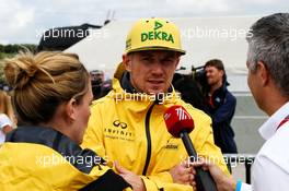 Nico Hulkenberg (GER) Renault Sport F1 Team with the media. 27.07.2017. Formula 1 World Championship, Rd 11, Hungarian Grand Prix, Budapest, Hungary, Preparation Day.