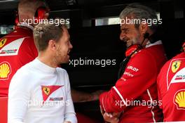 (L to R): Sebastian Vettel (GER) Ferrari with Maurizio Arrivabene (ITA) Ferrari Team Principal. 01.09.2017. Formula 1 World Championship, Rd 13, Italian Grand Prix, Monza, Italy, Practice Day.