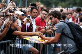 Fernando Alonso (ESP) McLaren signs autographs for the fans. 01.09.2017. Formula 1 World Championship, Rd 13, Italian Grand Prix, Monza, Italy, Practice Day.