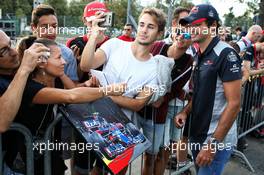 Carlos Sainz Jr (ESP) Scuderia Toro Rosso with fans. 01.09.2017. Formula 1 World Championship, Rd 13, Italian Grand Prix, Monza, Italy, Practice Day.