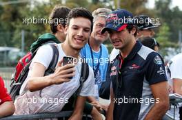Carlos Sainz Jr (ESP) Scuderia Toro Rosso with fans. 01.09.2017. Formula 1 World Championship, Rd 13, Italian Grand Prix, Monza, Italy, Practice Day.