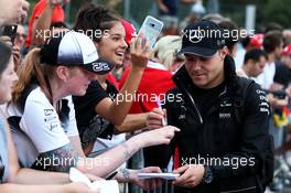 Valtteri Bottas (FIN) Mercedes AMG F1 signs autographs for the fans. 01.09.2017. Formula 1 World Championship, Rd 13, Italian Grand Prix, Monza, Italy, Practice Day.