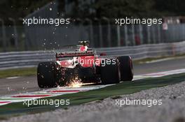 Kimi Raikkonen (FIN) Ferrari SF70H sends sparks flying. 01.09.2017. Formula 1 World Championship, Rd 13, Italian Grand Prix, Monza, Italy, Practice Day.