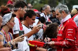 Maurizio Arrivabene (ITA) Ferrari Team Principal signs autographs for the fans. 01.09.2017. Formula 1 World Championship, Rd 13, Italian Grand Prix, Monza, Italy, Practice Day.