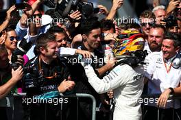 Race winner Lewis Hamilton (GBR) Mercedes AMG F1 celebrates with the team in parc ferme. 03.09.2017. Formula 1 World Championship, Rd 13, Italian Grand Prix, Monza, Italy, Race Day.