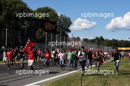 Fans invade the track and head to the podium. 03.09.2017. Formula 1 World Championship, Rd 13, Italian Grand Prix, Monza, Italy, Race Day.