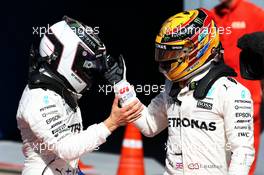 (L to R): second placed Valtteri Bottas (FIN) Mercedes AMG F1 celebrates with race winner and team mate Lewis Hamilton (GBR) Mercedes AMG F1. 03.09.2017. Formula 1 World Championship, Rd 13, Italian Grand Prix, Monza, Italy, Race Day.