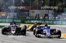 Pascal Wehrlein (GER) Sauber C36 and Kevin Magnussen (DEN) Haas VF-17 battle for position. 03.09.2017. Formula 1 World Championship, Rd 13, Italian Grand Prix, Monza, Italy, Race Day.