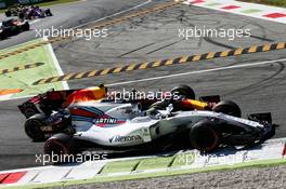 Felipe Massa (BRA) Williams FW40 and Max Verstappen (NLD) Red Bull Racing RB13 make contact. 03.09.2017. Formula 1 World Championship, Rd 13, Italian Grand Prix, Monza, Italy, Race Day.