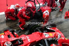 Kimi Raikkonen (FIN) Ferrari SF70H makes a pit stop - front brake catches fire. 02.09.2017. Formula 1 World Championship, Rd 13, Italian Grand Prix, Monza, Italy, Qualifying Day.