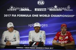 Lewis Hamilton (GBR) Mercedes AMG F1 W08 with Valtteri Bottas (FIN) Mercedes AMG F1 W08 and Sebastian Vettel (GER) Ferrari. 03.09.2017. Formula 1 World Championship, Rd 13, Italian Grand Prix, Monza, Italy, Race Day.