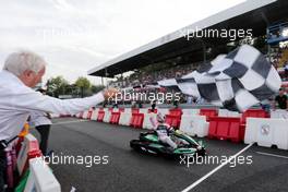 Sergio Perez (MEX) Sahara Force India F1 VJM10 at a Heineken Karting event takes the chequered flag waved by Charlie Whiting (GBR) FIA Delegate at the end of the race  31.08.2017. Formula 1 World Championship, Rd 13, Italian Grand Prix, Monza, Italy, Preparation Day.