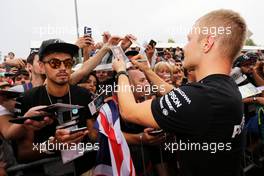 Valtteri Bottas (FIN) Mercedes AMG F1 signs autographs for the fans. 31.08.2017. Formula 1 World Championship, Rd 13, Italian Grand Prix, Monza, Italy, Preparation Day.