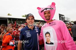 Sergio Perez (MEX) Sahara Force India F1 with a Pink Panther fan. 31.08.2017. Formula 1 World Championship, Rd 13, Italian Grand Prix, Monza, Italy, Preparation Day.
