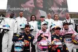 (L to R): Daniel Ricciardo (AUS) Red Bull Racing with Esteban Ocon (FRA) Sahara Force India F1 Team; Max Verstappen (NLD) Red Bull Racing; and Sergio Perez (MEX) Sahara Force India F1, with Jackie Stewart (GBR) and celebrity guests at a Heineken Karting event. 31.08.2017. Formula 1 World Championship, Rd 13, Italian Grand Prix, Monza, Italy, Preparation Day.