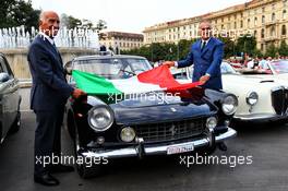 Dr. Angelo Sticchi Damiani (ITA) Aci Csai President (Left) at a drivers' parade in Milan. 31.08.2017. Formula 1 World Championship, Rd 13, Italian Grand Prix, Monza, Italy, Preparation Day.