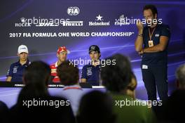 (L to R): Esteban Ocon (FRA) Sahara Force India F1 Team with Sergio Perez (MEX) Sahara Force India F1 and Sebastian Vettel (GER) Ferrari in the FIA Press Conference. 31.08.2017. Formula 1 World Championship, Rd 13, Italian Grand Prix, Monza, Italy, Preparation Day.
