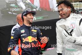 (L to R): Daniel Ricciardo (AUS) Red Bull Racing with Christian Karembeu (FRA) Former Football Player at a Heineken Karting event. 31.08.2017. Formula 1 World Championship, Rd 13, Italian Grand Prix, Monza, Italy, Preparation Day.