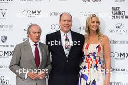 (L to R): Jackie Stewart (GBR) with HSH Prince Albert of Monaco (MON) and Sonia Irvine (GBR) at the Amber Lounge Fashion Show. 26.05.2017. Formula 1 World Championship, Rd 6, Monaco Grand Prix, Monte Carlo, Monaco, Friday.