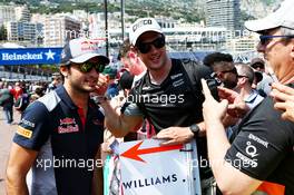 Carlos Sainz Jr (ESP) Scuderia Toro Rosso with fans. 26.05.2017. Formula 1 World Championship, Rd 6, Monaco Grand Prix, Monte Carlo, Monaco, Friday.