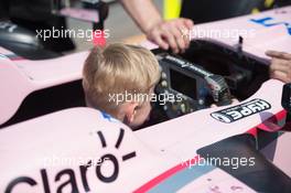 a young fans sits in the Sahara Force India F1 VJM10. 26.05.2017. Formula 1 World Championship, Rd 6, Monaco Grand Prix, Monte Carlo, Monaco, Friday.