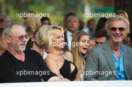 (L to R): Liam Cunningham (IRE) Actor with Pamela Anderson (USA) Actress and Eddie Irvine (GBR) at the Amber Lounge Fashion Show. 26.05.2017. Formula 1 World Championship, Rd 6, Monaco Grand Prix, Monte Carlo, Monaco, Friday.