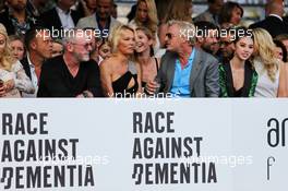(L to R): Liam Cunningham (IRE) Actor; Pamela Anderson (USA) Actress; and Eddie Irvine (GBR) at the Amber Lounge Fashion Show. 26.05.2017. Formula 1 World Championship, Rd 6, Monaco Grand Prix, Monte Carlo, Monaco, Friday.