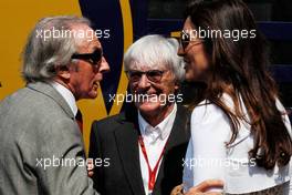 (L to R): Jackie Stewart (GBR) with Bernie Ecclestone (GBR) and Fabiana Flosi (BRA). 26.05.2017. Formula 1 World Championship, Rd 6, Monaco Grand Prix, Monte Carlo, Monaco, Friday.