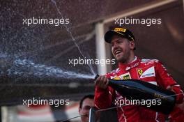 Race winner Sebastian Vettel (GER) Ferrari celebrates on the podium. 28.05.2017. Formula 1 World Championship, Rd 6, Monaco Grand Prix, Monte Carlo, Monaco, Race Day.
