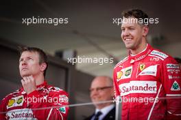 Kimi Raikkonen (FIN) Ferrari SF70H and Sebastian Vettel (GER) Ferrari. 28.05.2017. Formula 1 World Championship, Rd 6, Monaco Grand Prix, Monte Carlo, Monaco, Race Day.