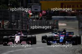 Sergio Perez (MEX) Sahara Force India F1 VJM10 and Daniil Kvyat (RUS) Scuderia Toro Rosso STR12 battle for position. 28.05.2017. Formula 1 World Championship, Rd 6, Monaco Grand Prix, Monte Carlo, Monaco, Race Day.