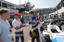 Robert Shwartzman (RUS) Formula Renault Eurocup Driver with Boris Rotenberg (RUS) SMP Bank and SGM Group Co-Owner and Mika Salo (FIN). 28.05.2017. Formula 1 World Championship, Rd 6, Monaco Grand Prix, Monte Carlo, Monaco, Race Day.