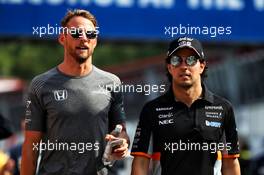 (L to R): Jenson Button (GBR) McLaren with Sergio Perez (MEX) Sahara Force India F1. 25.05.2017. Formula 1 World Championship, Rd 6, Monaco Grand Prix, Monte Carlo, Monaco, Practice Day.