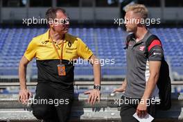 Alan Permane (GBR) Renault Sport F1 Team Trackside Operations Director and Kevin Magnussen (DEN) Haas F1 Team  24.05.2017. Formula 1 World Championship, Rd 6, Monaco Grand Prix, Monte Carlo, Monaco, Preparation Day.